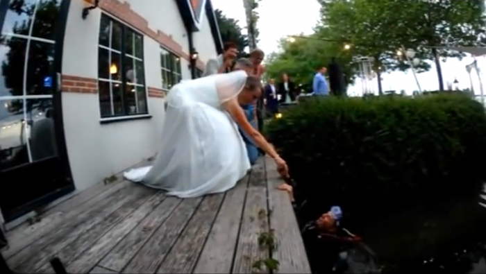 Diving for wedding rings during wedding ceremony
