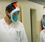 Corona verplegers voelen zich sportduikers met aangepaste maskers